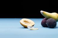 Sliced Lemon and Green Fruit