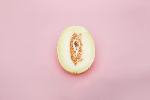 Free Sliced Melon Fruit on the Pink Table Stock Photo