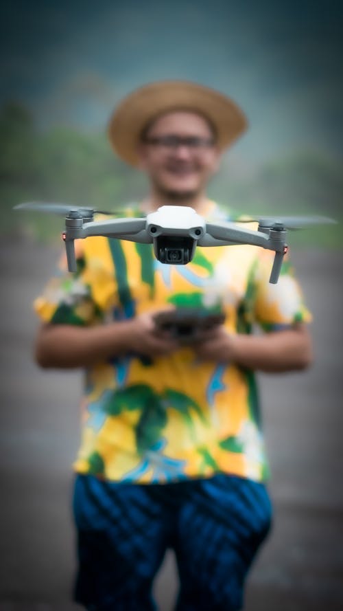 arka plan bulanık, dikey atış, drone içeren Ücretsiz stok fotoğraf