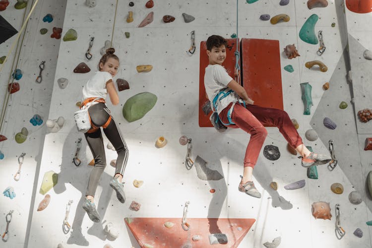 Kids Wearing A Wall Climbing Gears