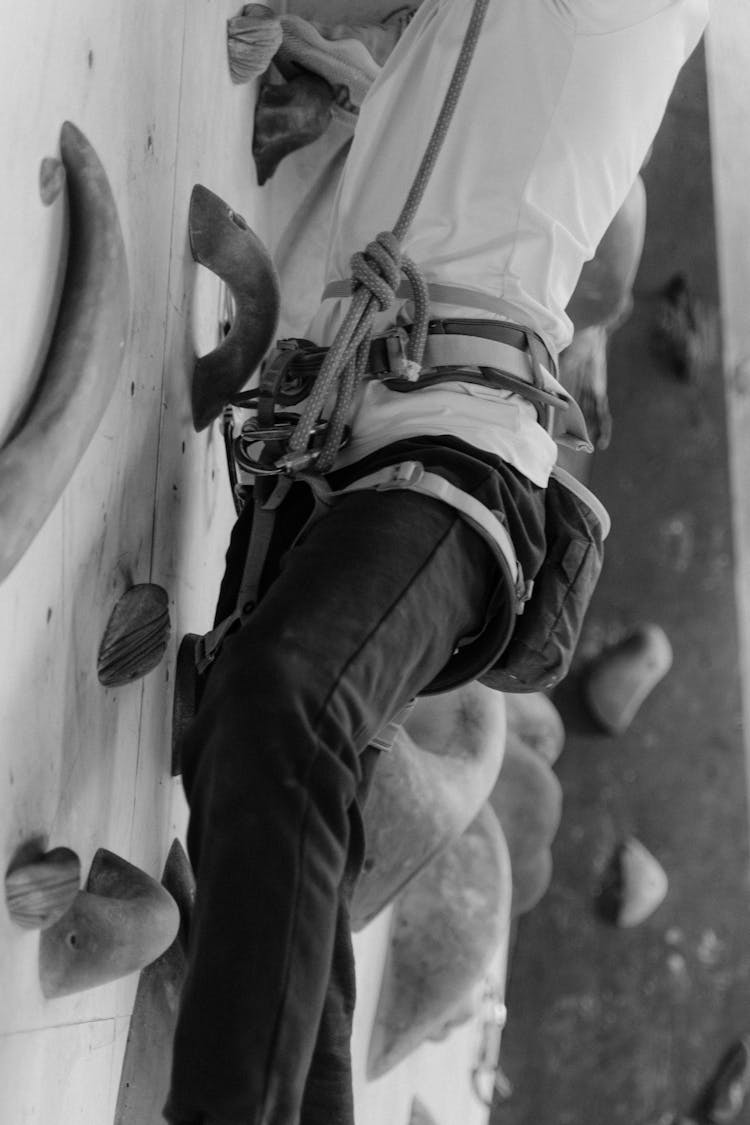 Person Climbing A Rock Wall