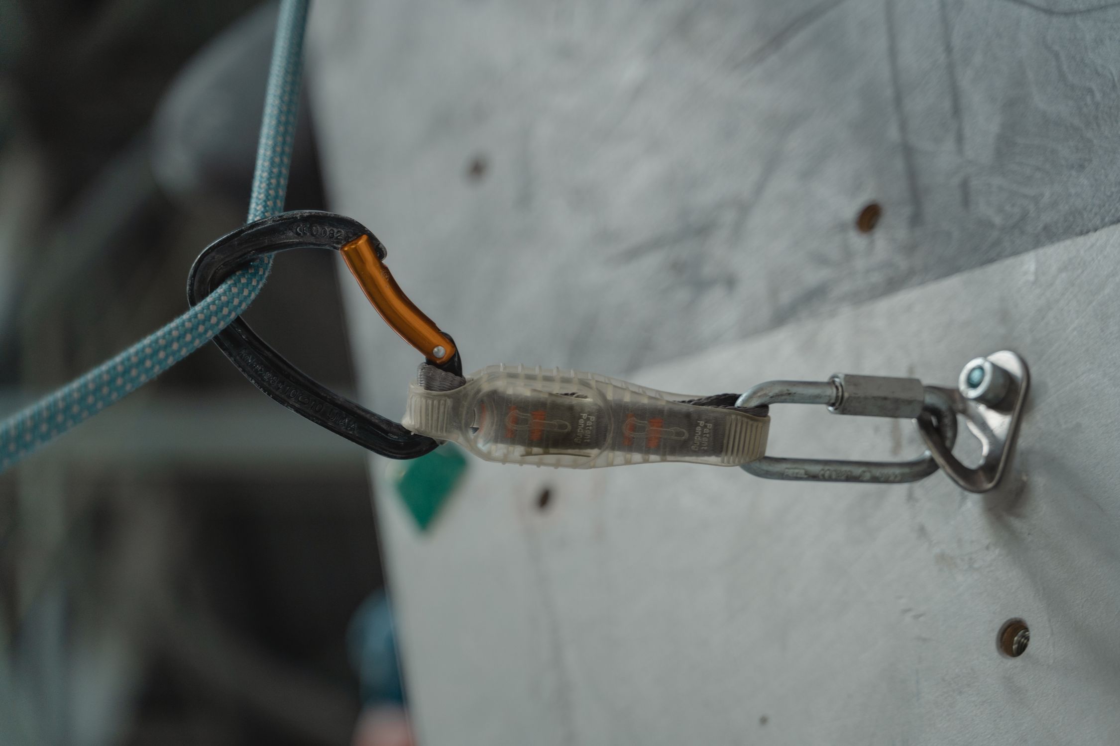 Rope and Carabiner on a Climbing Wall · Free Stock Photo