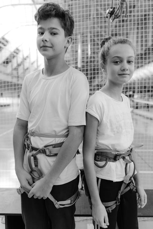 Two Children Wearing Climbing Harness