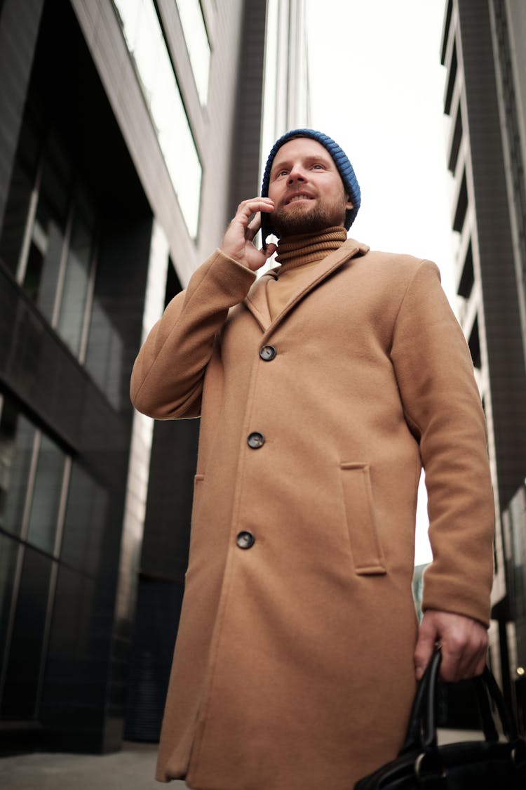 A Businessman Talking On The Phone 