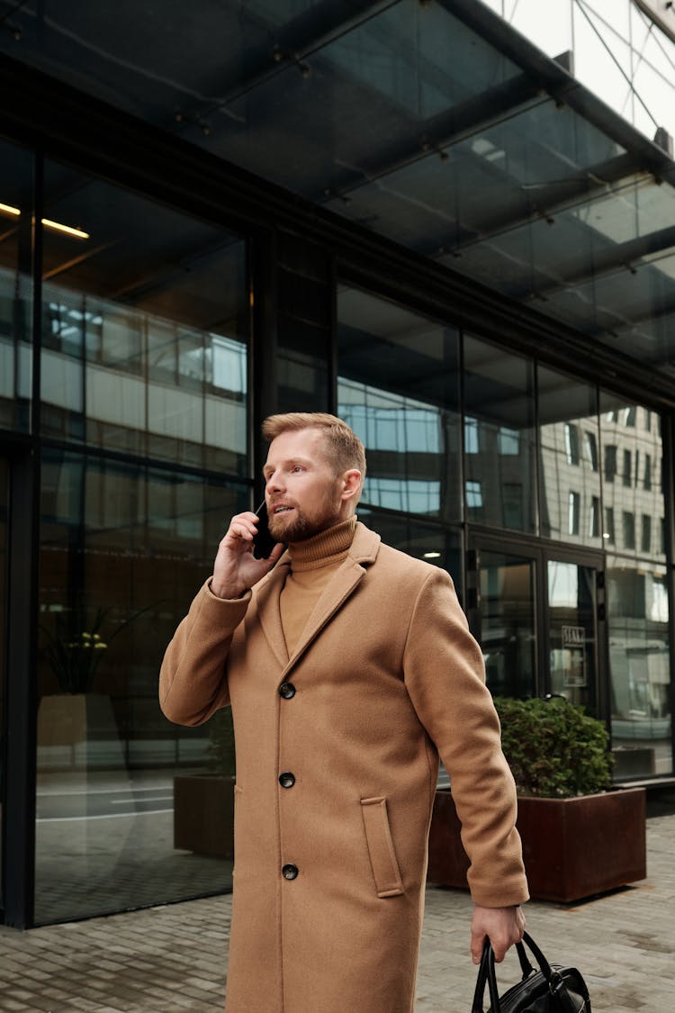 A Businessman Talking On The Phone