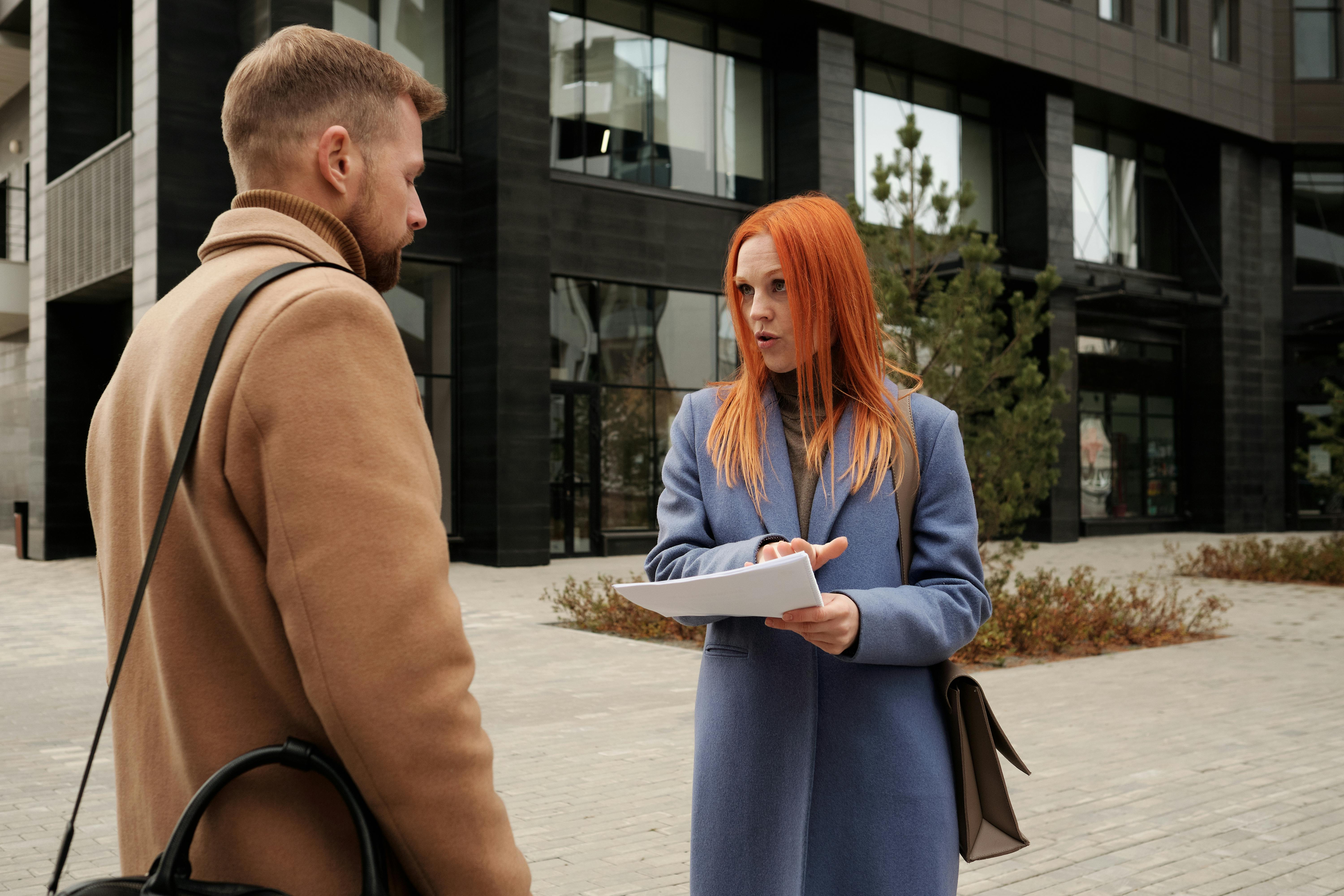 Man and Woman Having a Conversation · Free Stock Photo