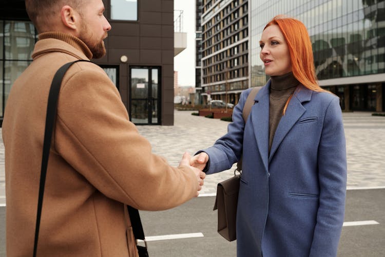 Man And Woman Making A Deal