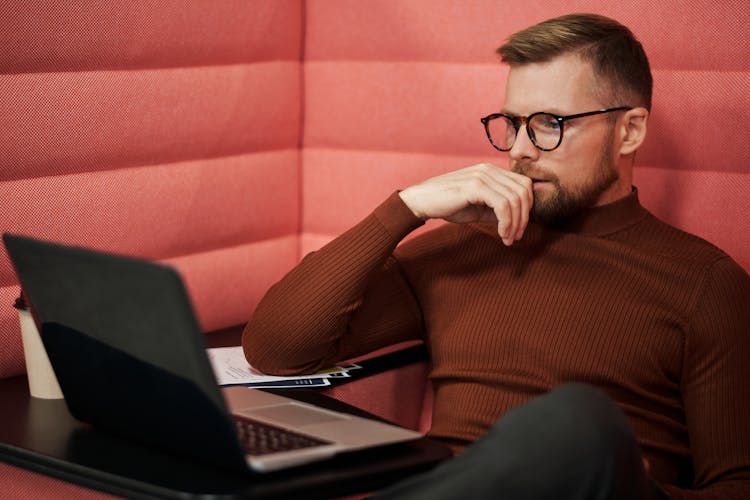 A Businessman Working Online 