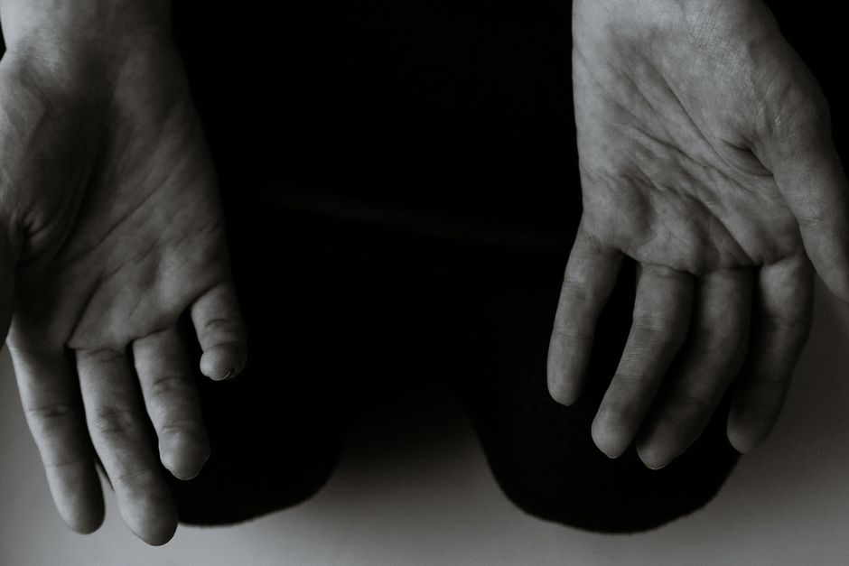 hands resting calm chair therapy room