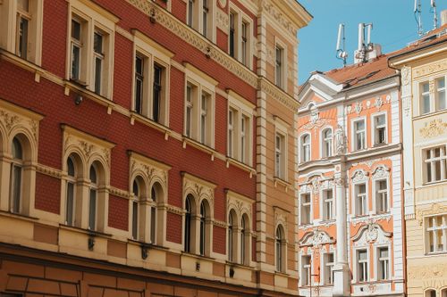 Free Beautiful classic architecture with intricate facades in an old town setting. Stock Photo