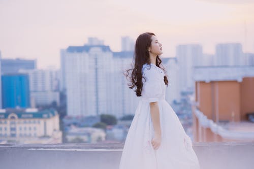 Free Photo of a Woman in White Dress Stock Photo