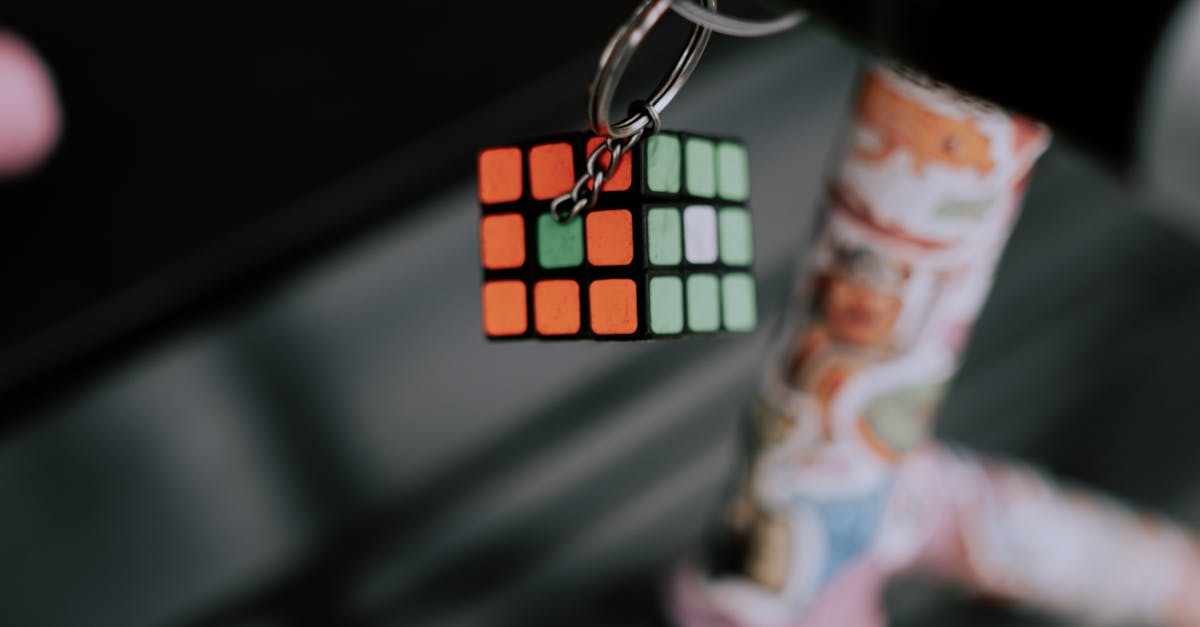 Key Holder in Shape of Rubik Cube Tied to Bike · Free Stock Photo