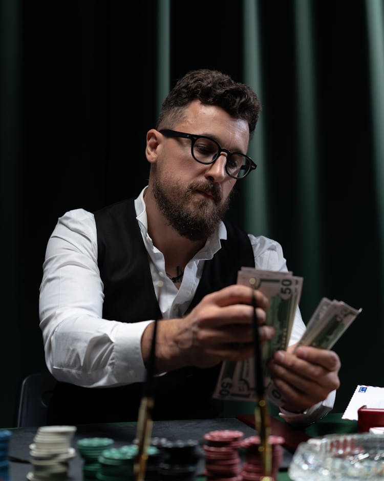 Bearded Man Counting Money 