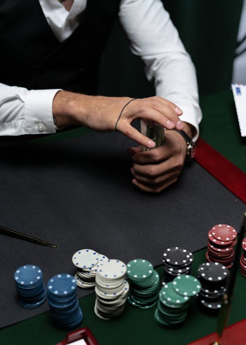 Free Stacked Casino Tokens on Table Top  Stock Photo