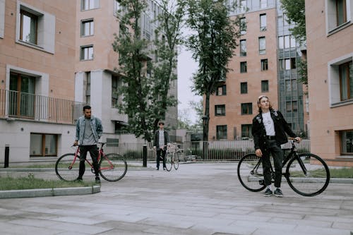 Free Three Men Posing with their Bicycles Stock Photo