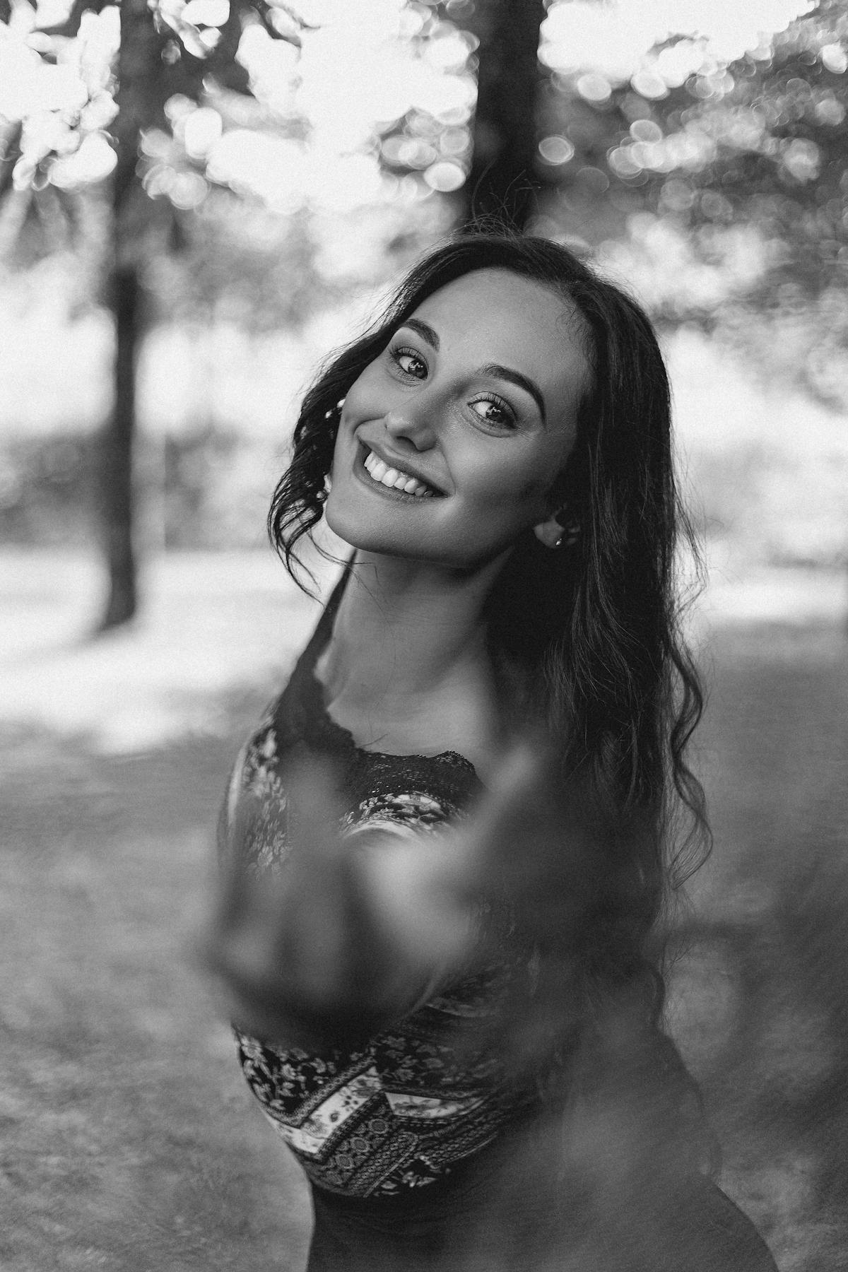 Assorted ultra-processed snacks such as chips, candy, and packaged baked goods on a table.