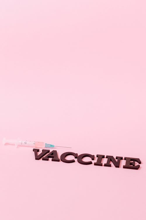 ピンクの表面にコビッドワクチン