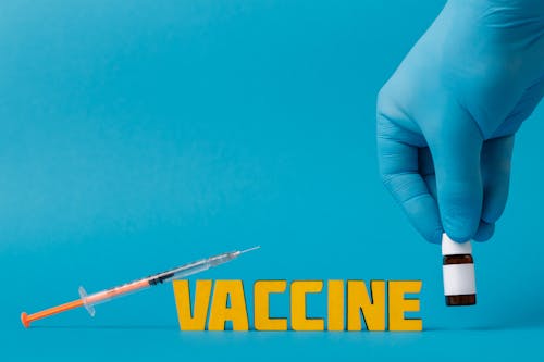 Vacina Covid Na Superfície Azul