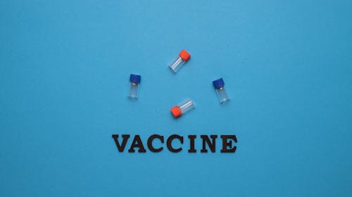 Vaccine Text on Blue Surface