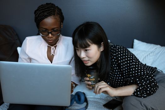 Photo Of Women Helping Each Other At Work 