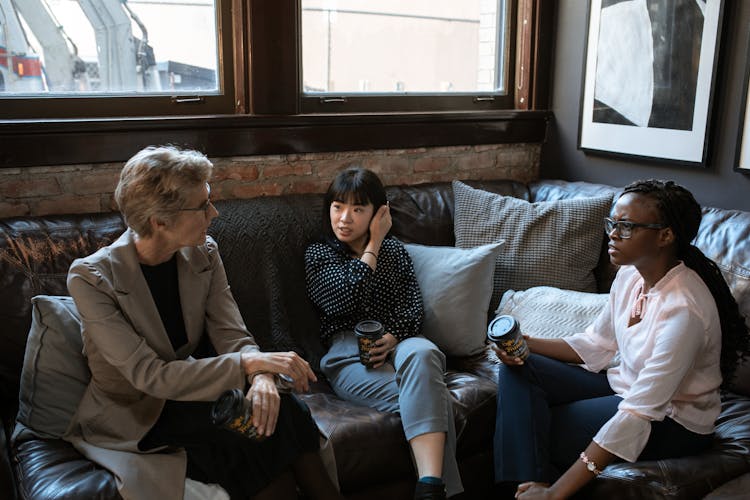 Three Women Talking Together 