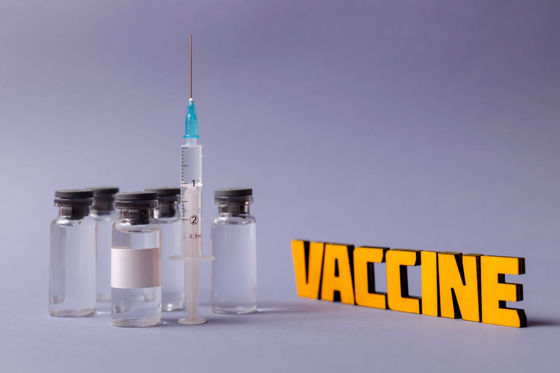бесплатная вакцины Covid19 и инъекции Стоковое фото