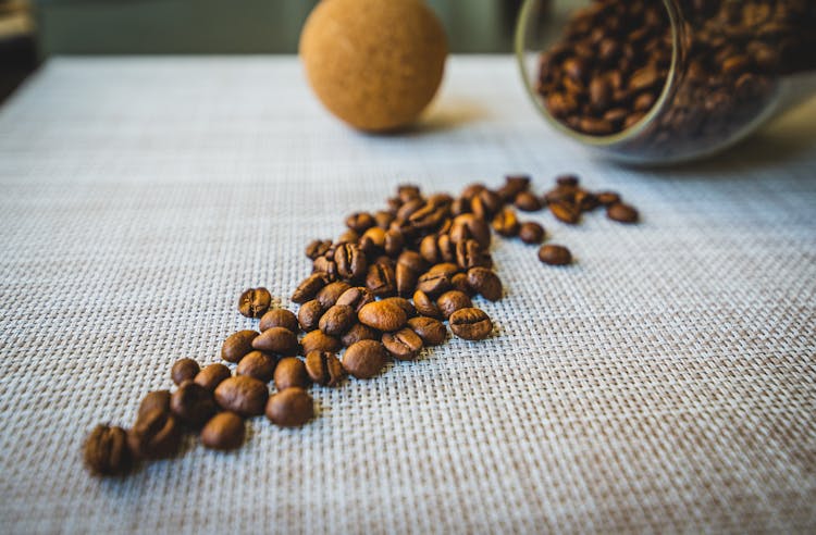 Close Up Of Coffee Beans On Table