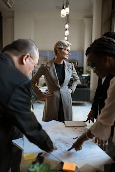 Business team strategizing in a contemporary office setting.
