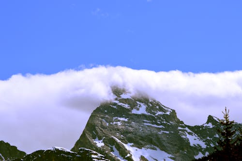 Ingyenes stockfotó fehér felhők, festői kilátás, havas hegyek témában Stockfotó
