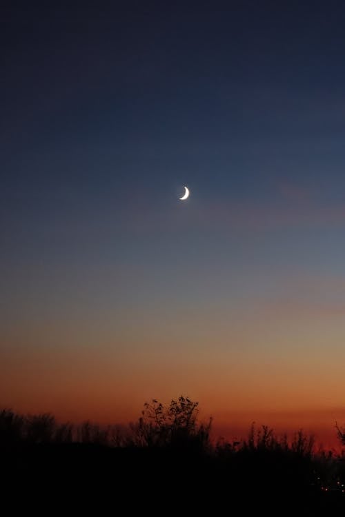 Photo of the Sky with Crescent Moon at Dusk