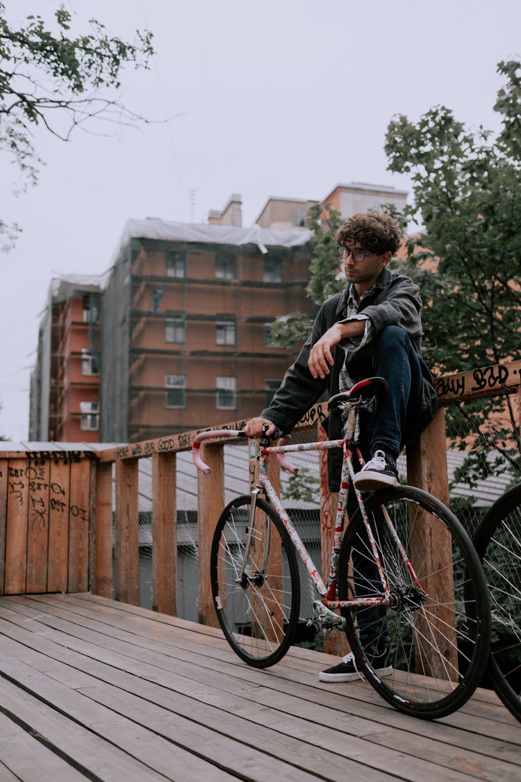 Man Stepping On His Fixie Bike