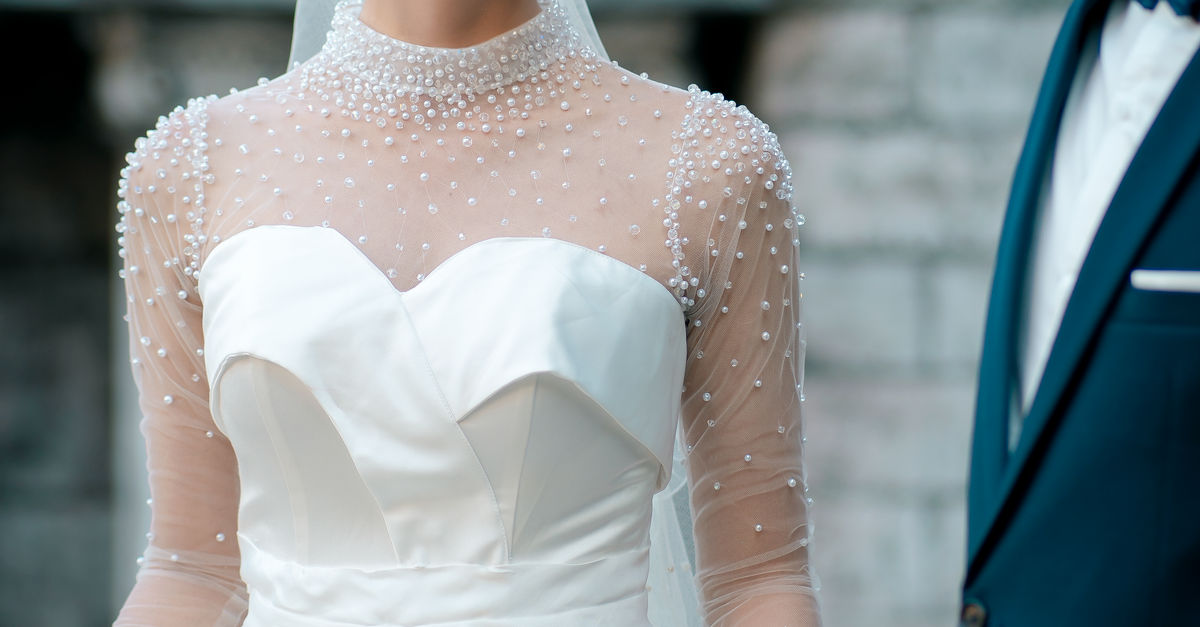 A Beautiful Bride in a White Wedding Dress · Free Stock Photo