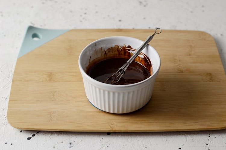 Chocolate Syrup On Ramekin