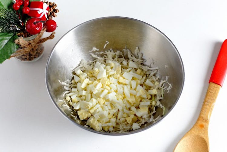 Chopped Boiled Eggs With Vegetable On Stainless Steel Bowl