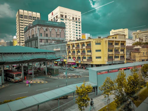 Downtown Cityscape Under Dark Clouds