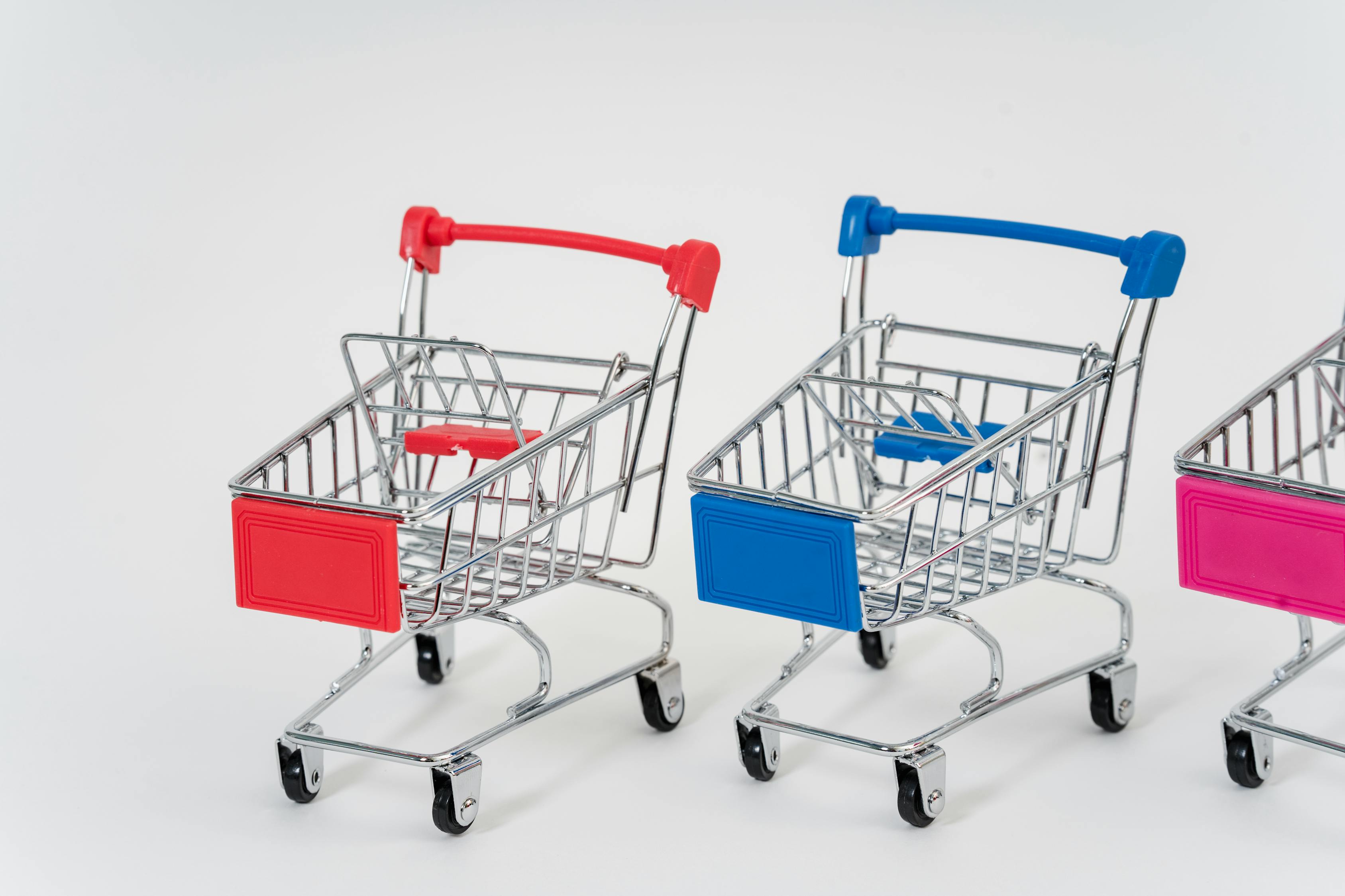 Close-Up Photo Of Miniature Push Carts · Free Stock Photo