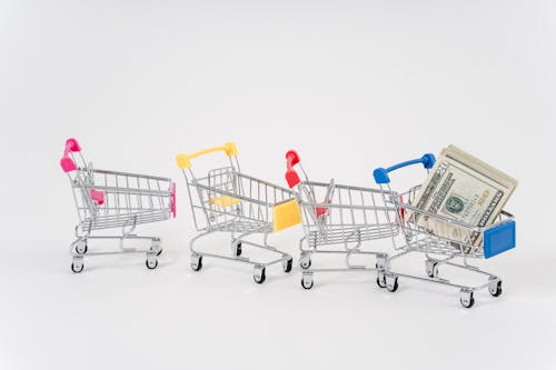 Free Photo Of Assorted Colored Mini Shopping Carts Stock Photo