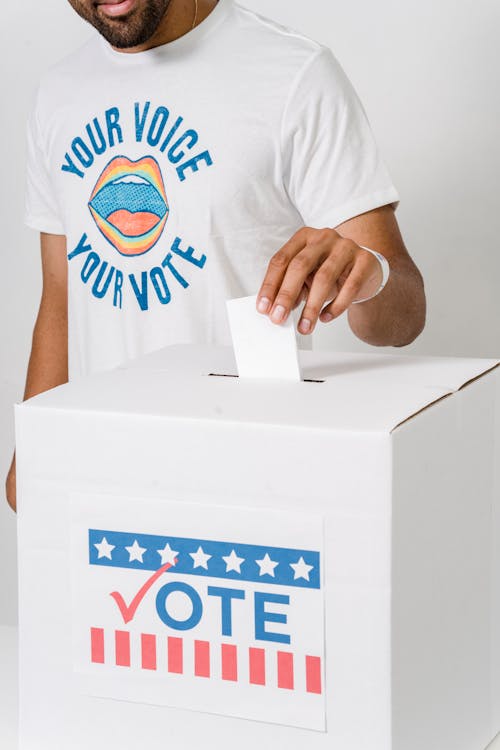 Free Photo Of Person Dropping His Vote Stock Photo