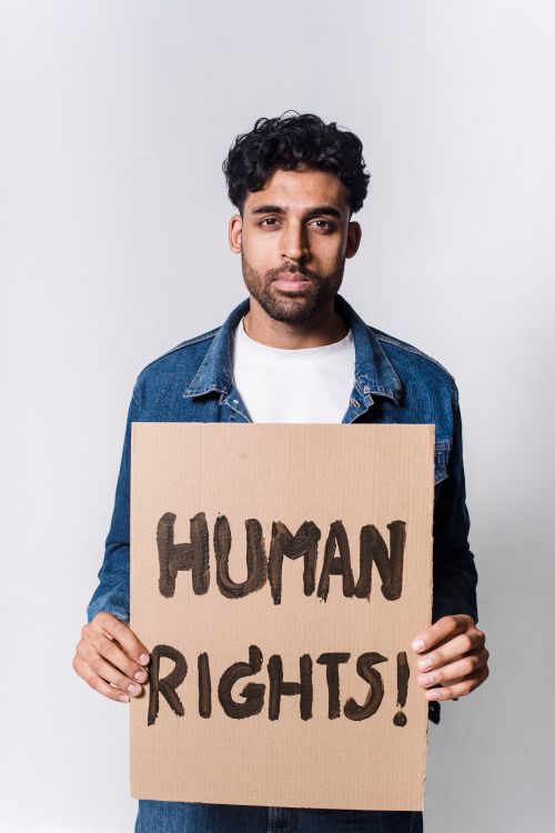 Man Rights Pictures Man In Blue And White Long Sleeve Shirt Holding Human Rights Text ...