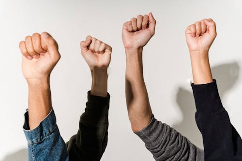 Free Raised Clenched Fists Stock Photo