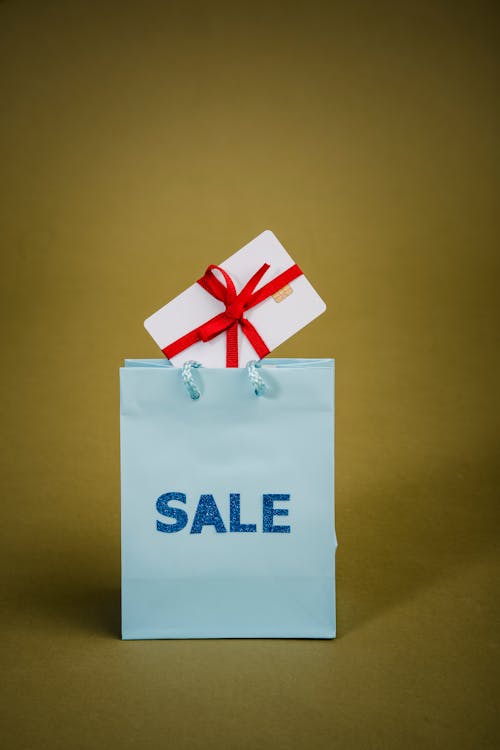 Sale Text On Blue Paper Bag With Gift Box