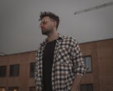 Man in White Brown Plaid Button Up Shirt