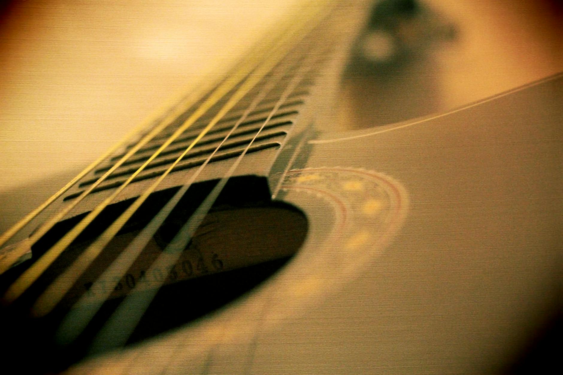 Close-up Photo of Black Guitar · Free Stock Photo