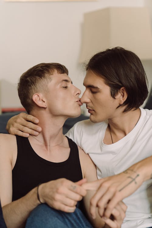 Free Man Kissing His Boyfriend on the Nose  Stock Photo