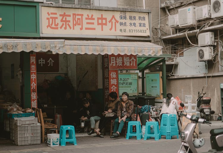 Street In An Asian City With A Group Of Women