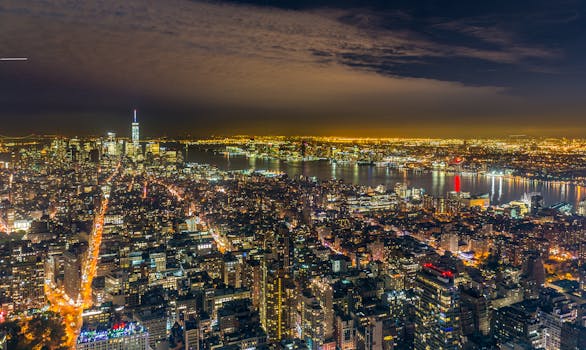 A breathtaking aerial view of New York City's illuminated skyline at night.