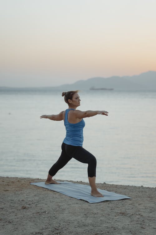 A Woman in a Warrior 2 Yoga Pose