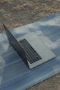Gray Laptop on Blue Yoga Mat