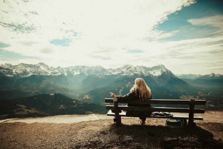 Woman Sitting On Bench