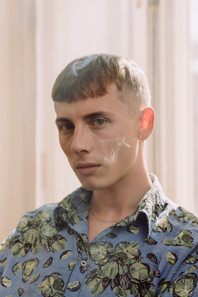 Man In Green And Blue Floral Button Up Shirt